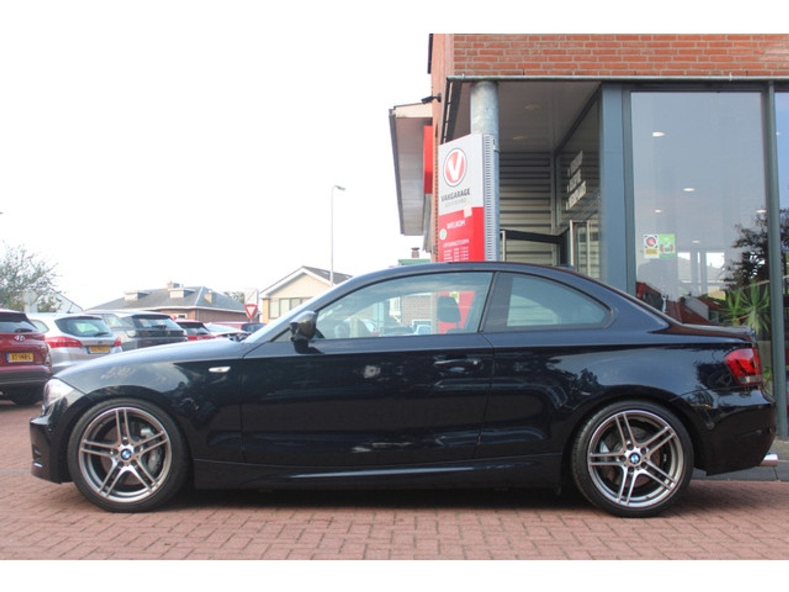 BMW 1 Serie 135i Coupé Handgeschakeld *High Executive* | Sc, Auto's, 1-Serie, Euro 5, Gebruikt, Zwart