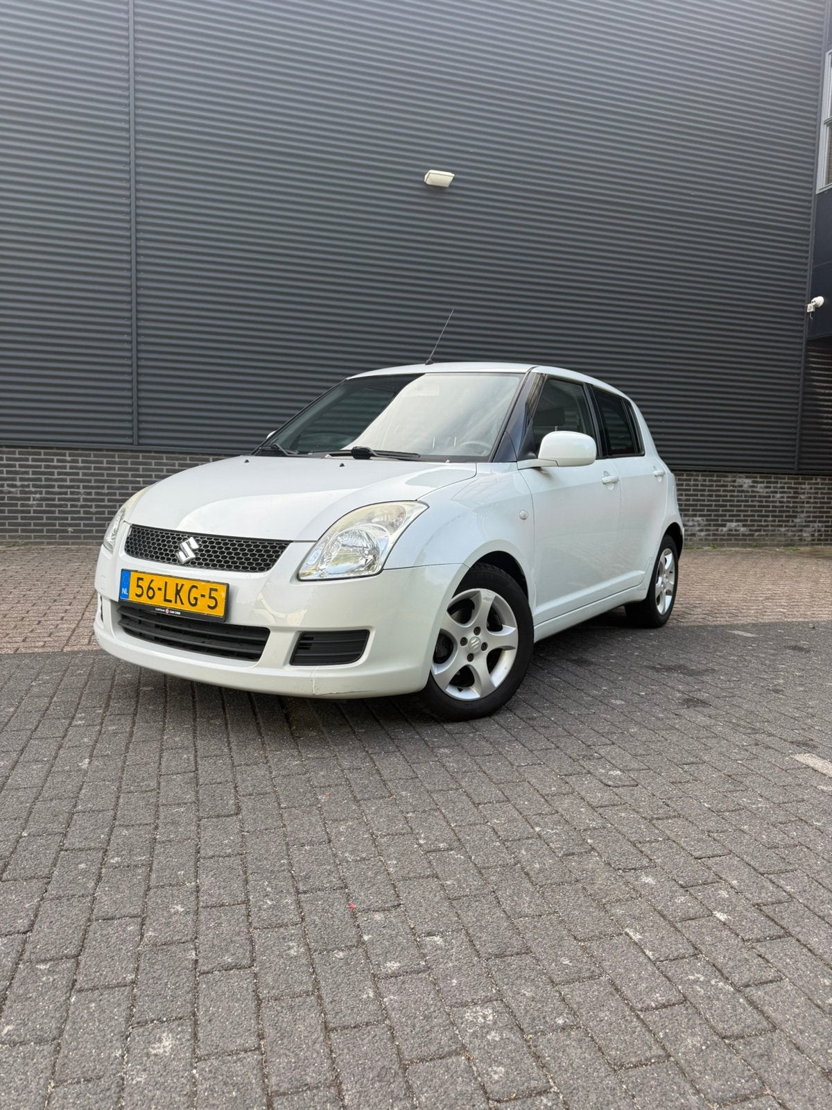 Suzuki Swift 1.3 5D 2010 Wit, Auto's, Voorwielaandrijving, Stof, 40 €/maand, 400 kg