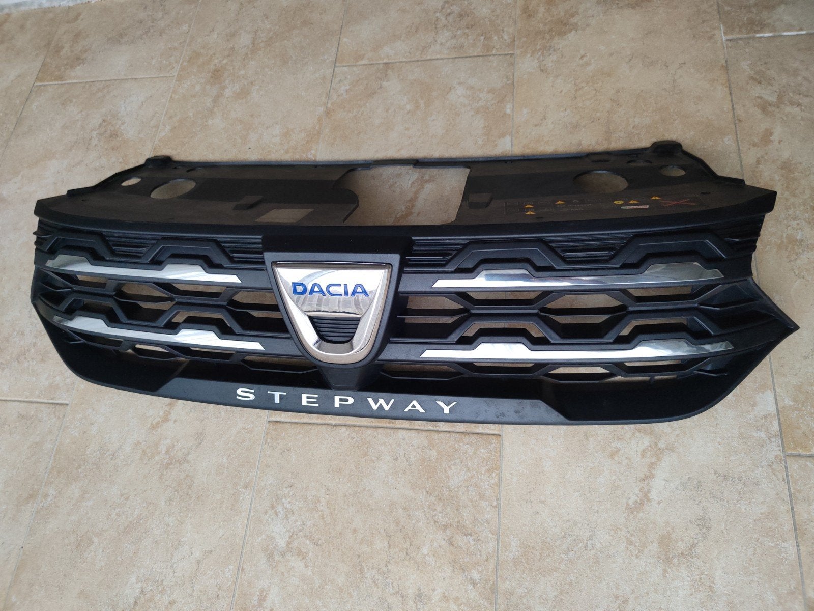 Dacia Sandero Stepway voor Grill origineel, Ophalen of Verzenden, Voor, Dacia, Bumper