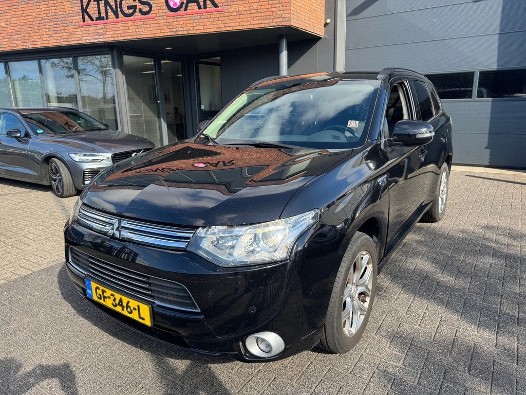 Mitsubishi Outlander 2.0 PHEV Business XENON CAMERA CRUISE T, Auto's, Mitsubishi, 4 cilinders, Zwart, Vierwielaandrijving, Hybride Elektrisch/Benzine