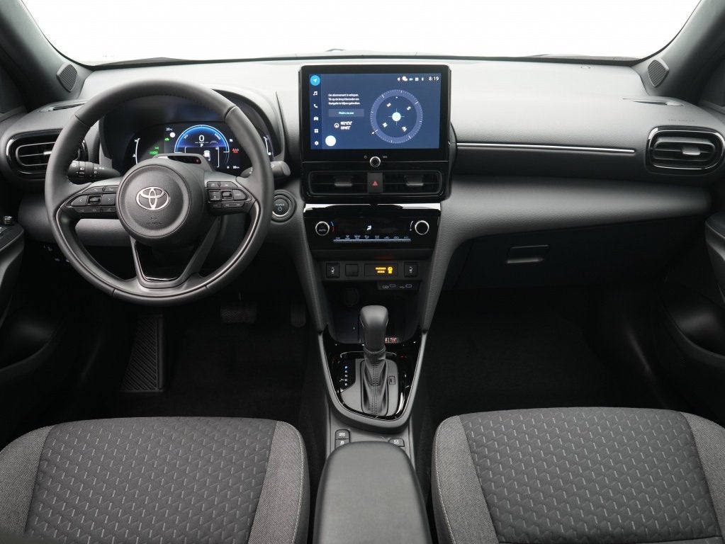 Toyota Yaris Cross 1.5 Hybrid 130 Executive | Camera | Priva, Auto's, Stof, Gebruikt, 750 kg, Grijs