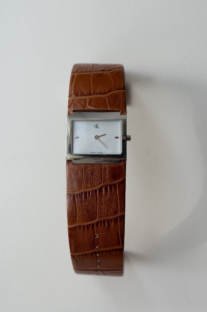 Calvin Klein dameshorloge – Swiss Made – Cognac Leer, Sieraden, Tassen en Uiterlijk, Overige merken, Leer, Staal, Polshorloge