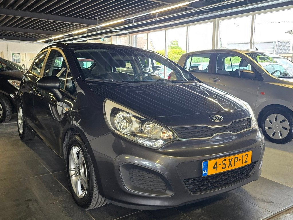 Kia Rio 1.2 CVVT Comfort Pack/AIRCO/5-DEURS/BOEKJES/, Zwart, 4 cilinders, Elektrische ramen, Origineel Nederlands