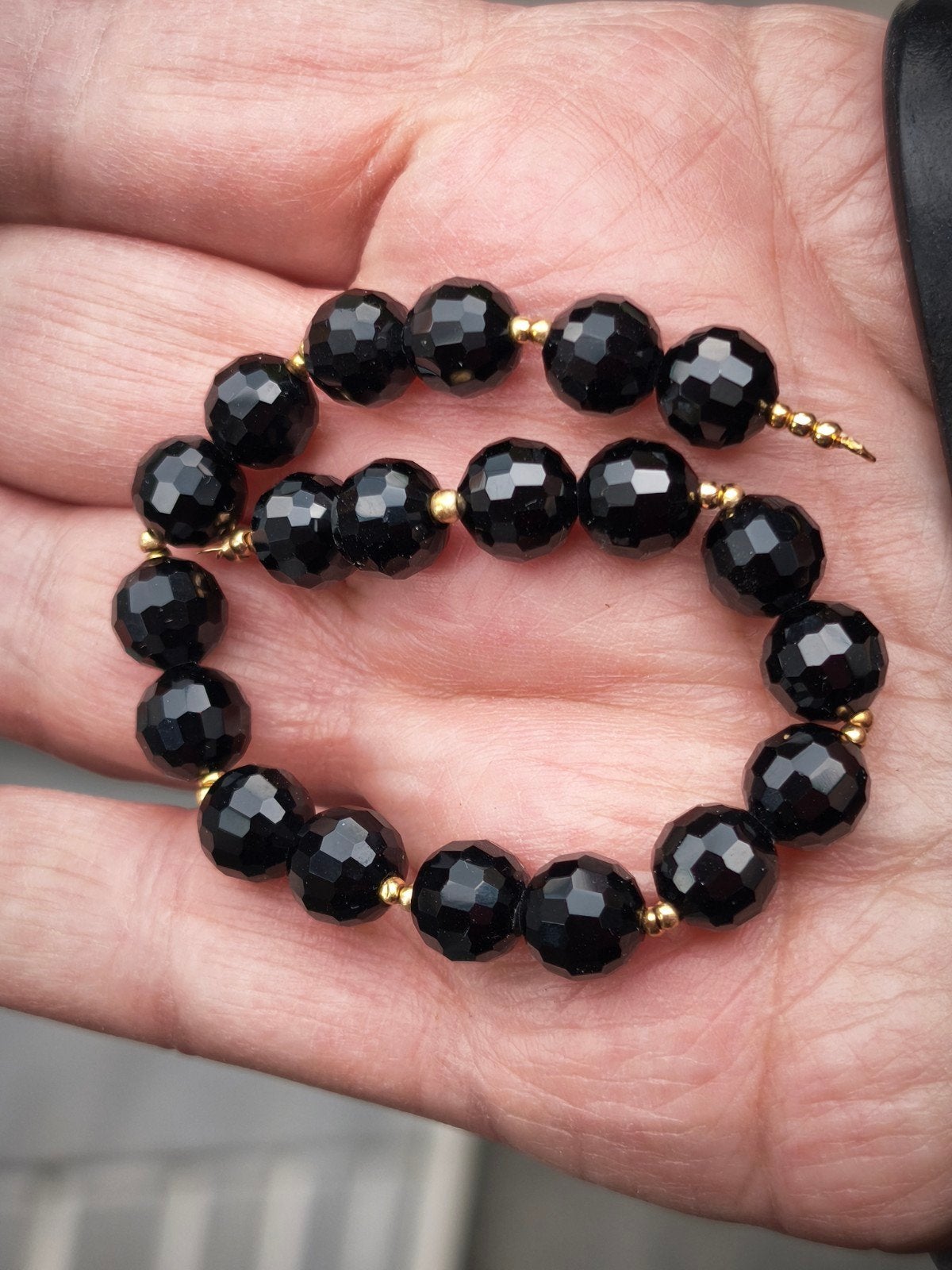 Armband met Onyx 18 karaat 

Sluiting en bollet, Ophalen, Zo goed als nieuw, Met edelsteen, Goud