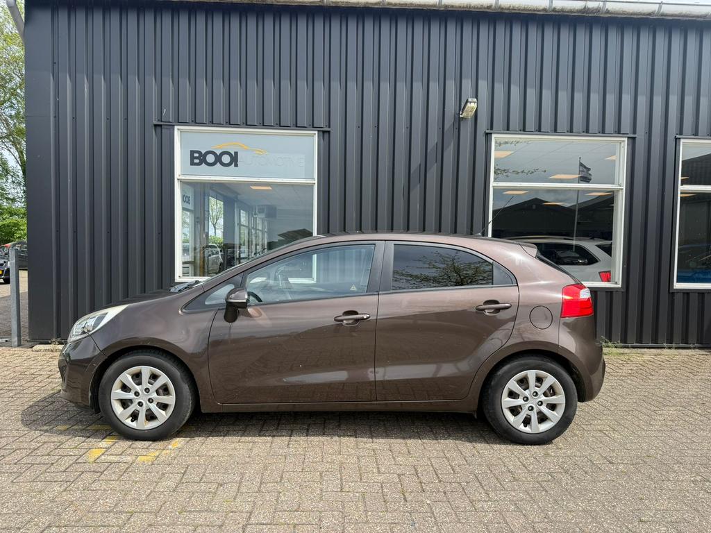 Kia Rio 1.2 I 5DRS Clima trekhaak, Auto's, 40 €/maand, Zwart, 4 cilinders, Bruin