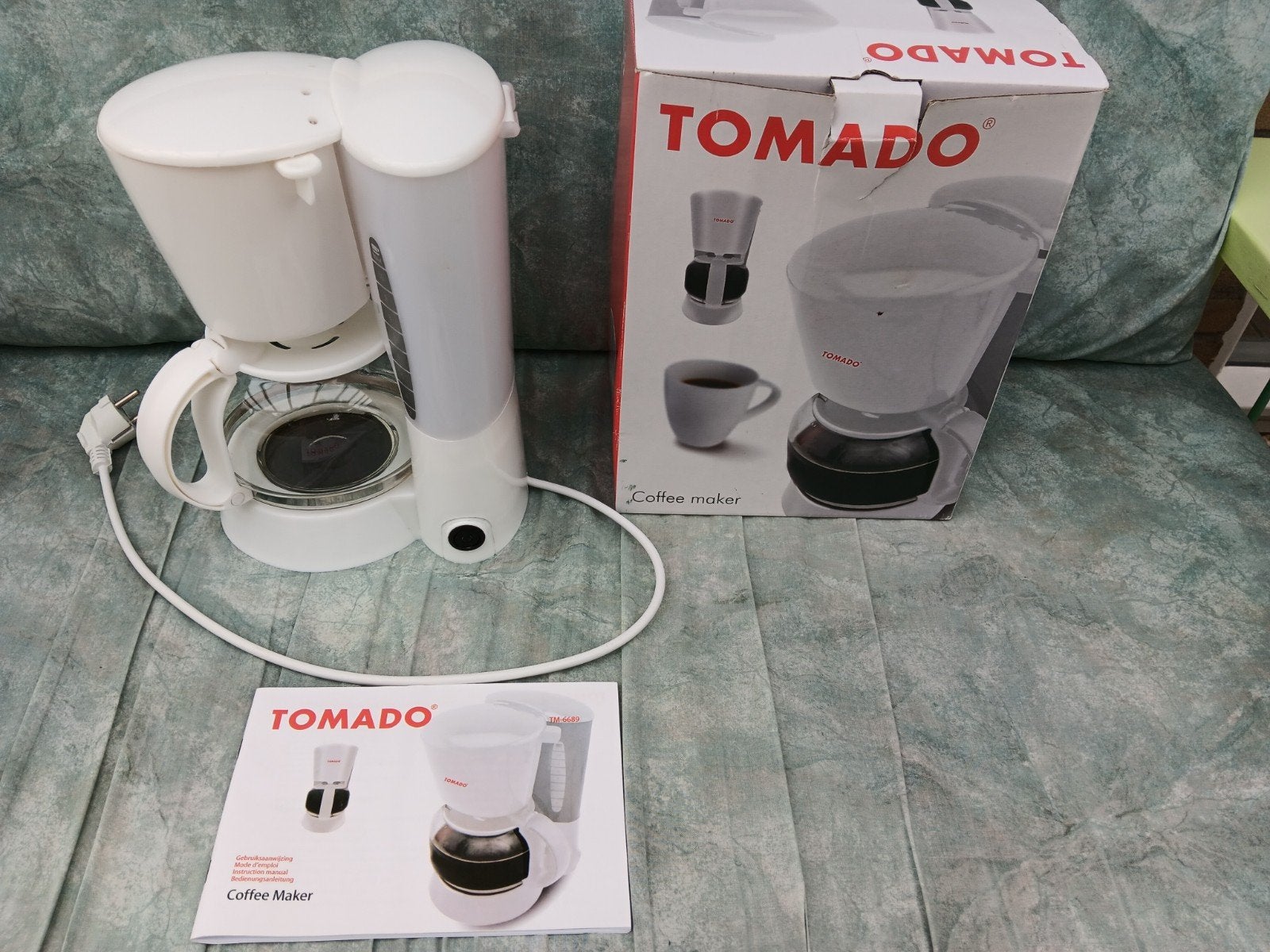 Tomado koffie apparaat, Ophalen