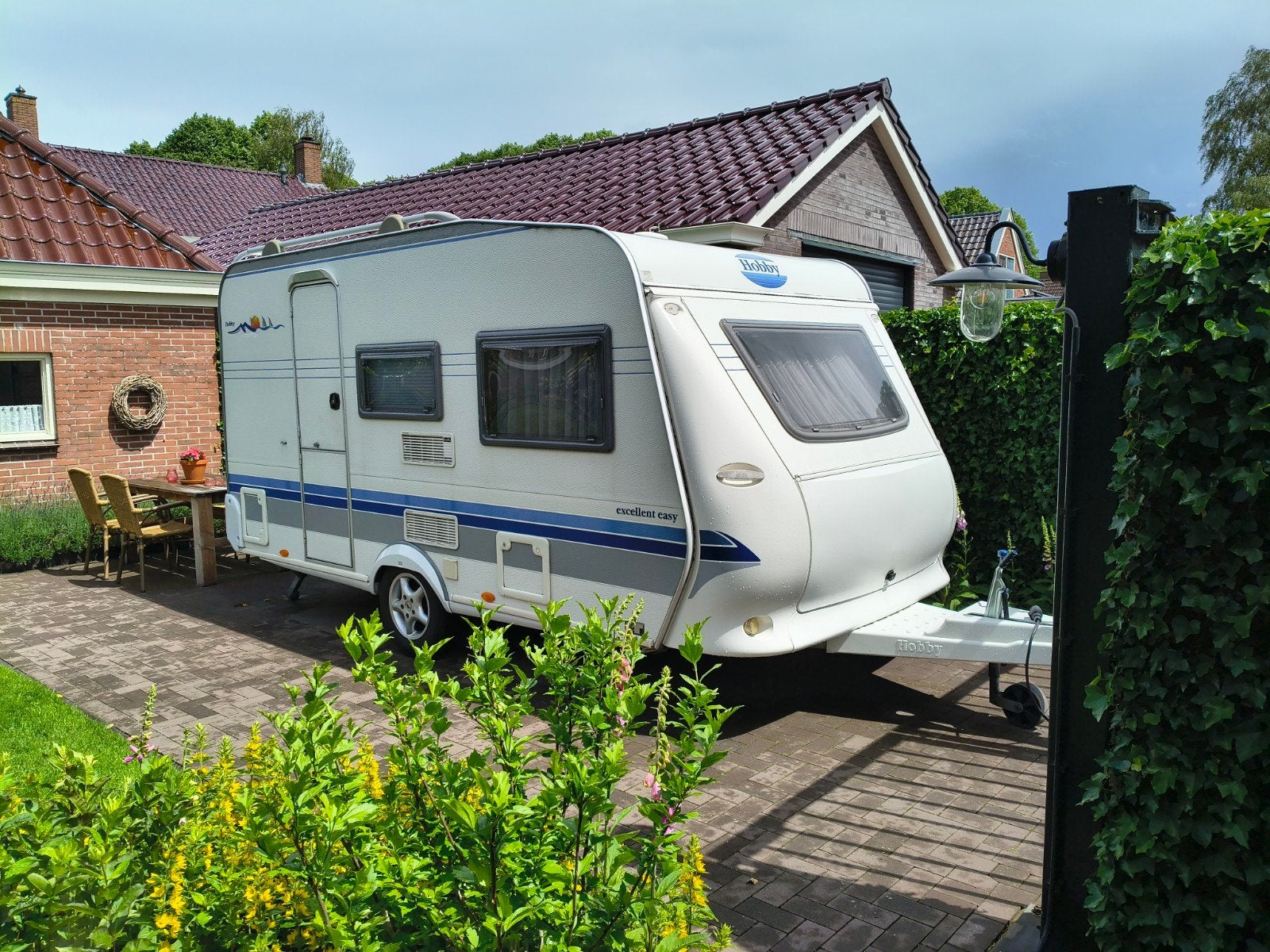 Zeer nette Hobby 400SB Exelent easy 2003 inclusief voortent, Caravans en Kamperen, Luifel, Hobby, Treinzit, Particulier