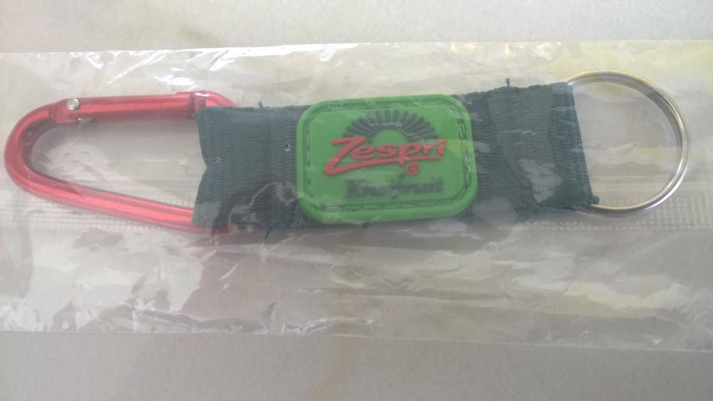 Nieuw : Zespri / kiwi sleutelhanger of winkelwagen muntje, Ophalen of Verzenden, Nieuw, Gebruiksvoorwerp