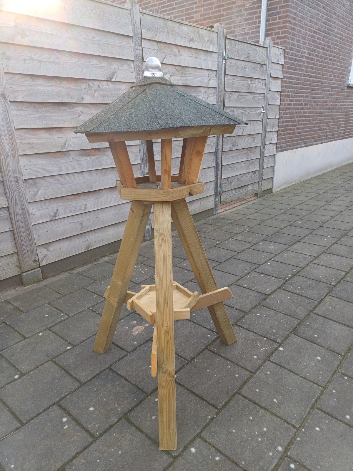 Vogelvoederhuisjes, Ophalen