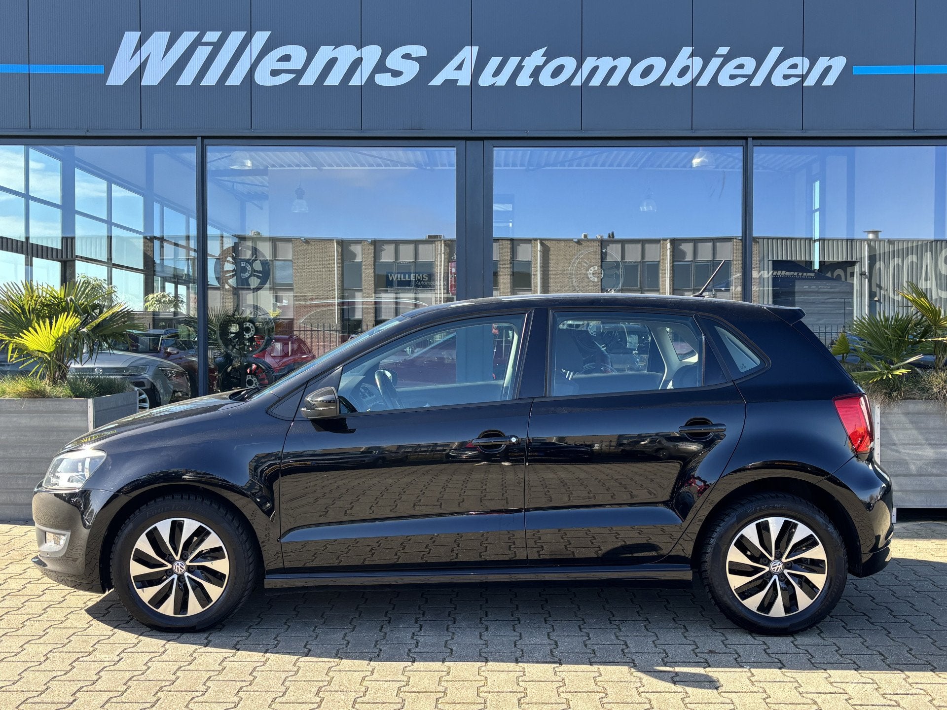 Volkswagen Polo 1.0 BlueMotion Cruise Control, Airco & LM 15, Auto's, Voorwielaandrijving, Stof, Zwart, Origineel Nederlands