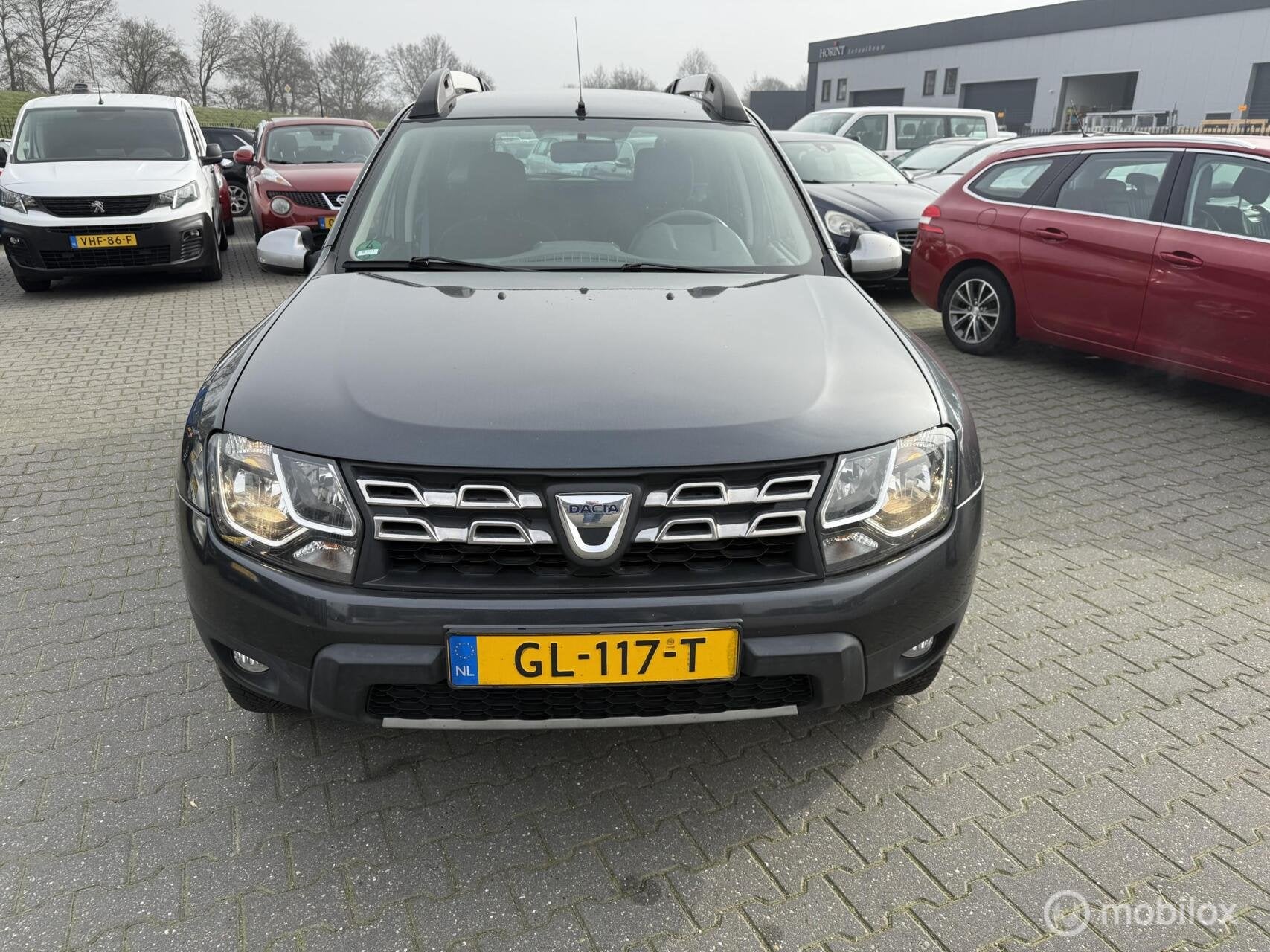 Dacia Duster 1.2 TCe 4x2 Ambiance ex bpm, Auto's, Voorwielaandrijving, Euro 5, Gebruikt, Zwart