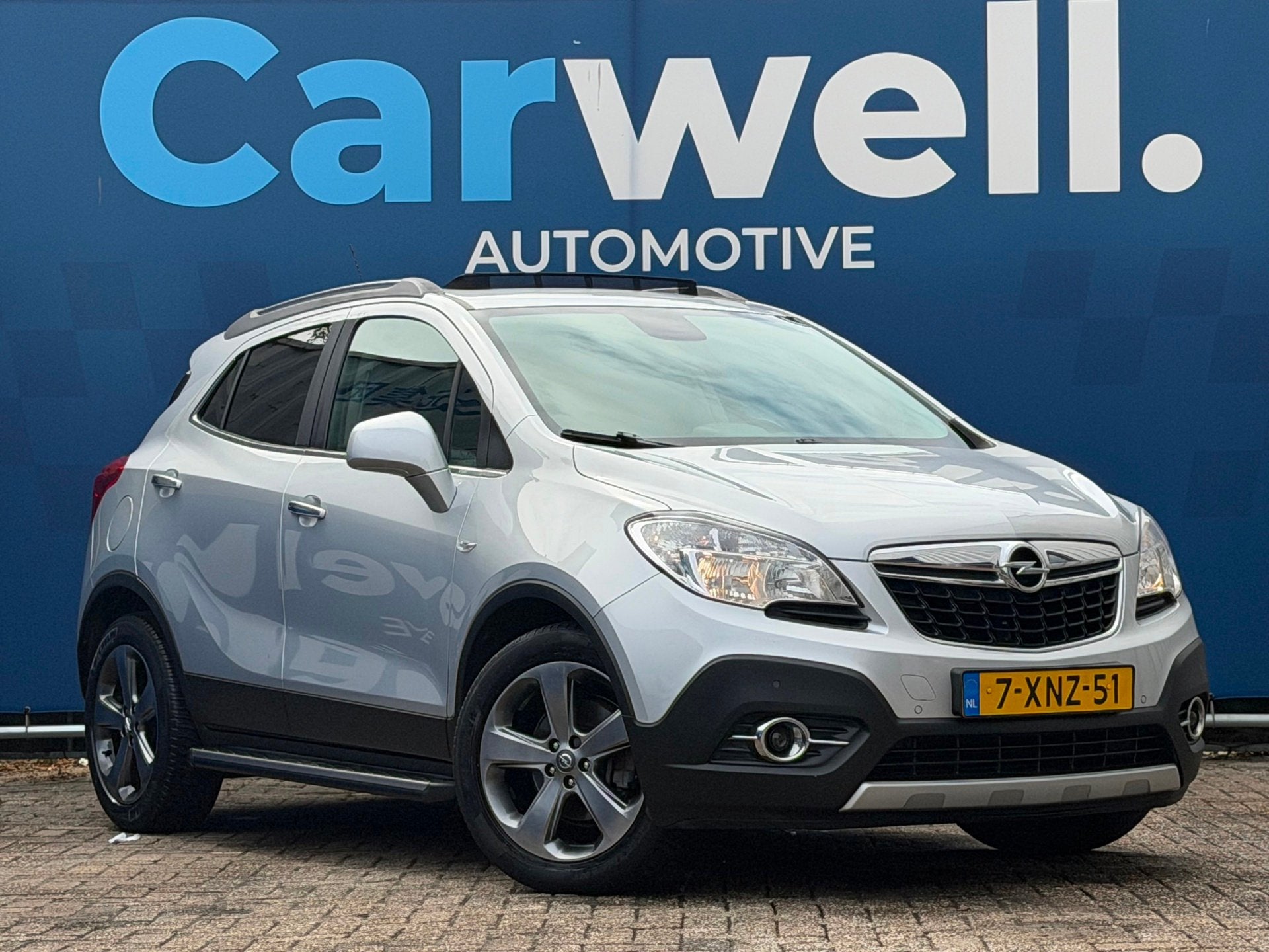 Opel Mokka 1.4 T Cosmo|Trekhaak|Pano|Leder|Stoelvw|Stuurvw|N, Auto's, Voorwielaandrijving, Gebruikt, 4 cilinders, Handgeschakeld