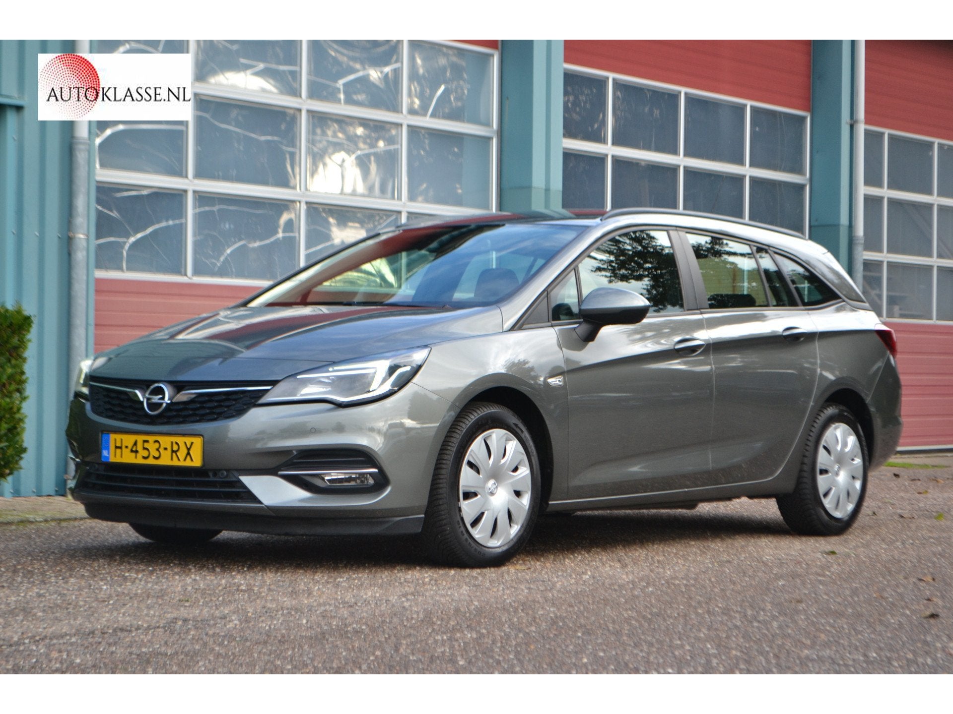 Opel Astra Sports Tourer 1.2 Business Edition (bj 2020), Voorwielaandrijving, Stof, Gebruikt, 1199 cc