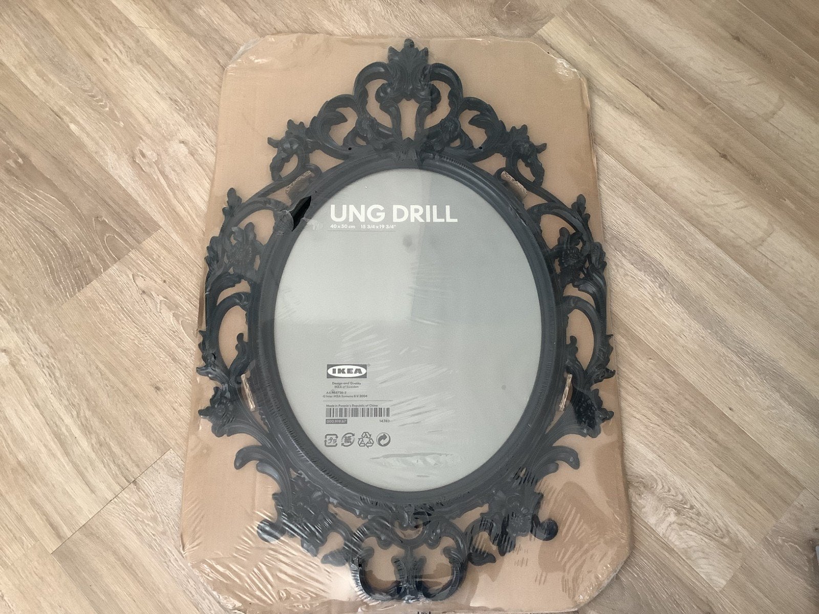 IKEA UNG DRILL spiegel - Zwart, ovaal, 40x50 cm Nieuw, Huis en Inrichting, Woonaccessoires | Spiegels, Ophalen, Minder dan 50 cm