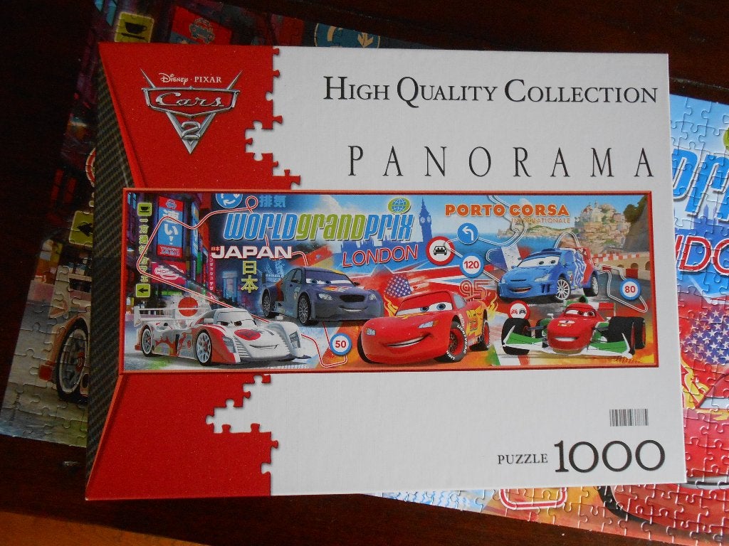 legpuzzel Disney Pixar Cars 2 compleet en netjes, Ophalen of Verzenden, 500 t/m 1500 stukjes, Zo goed als nieuw, Legpuzzel