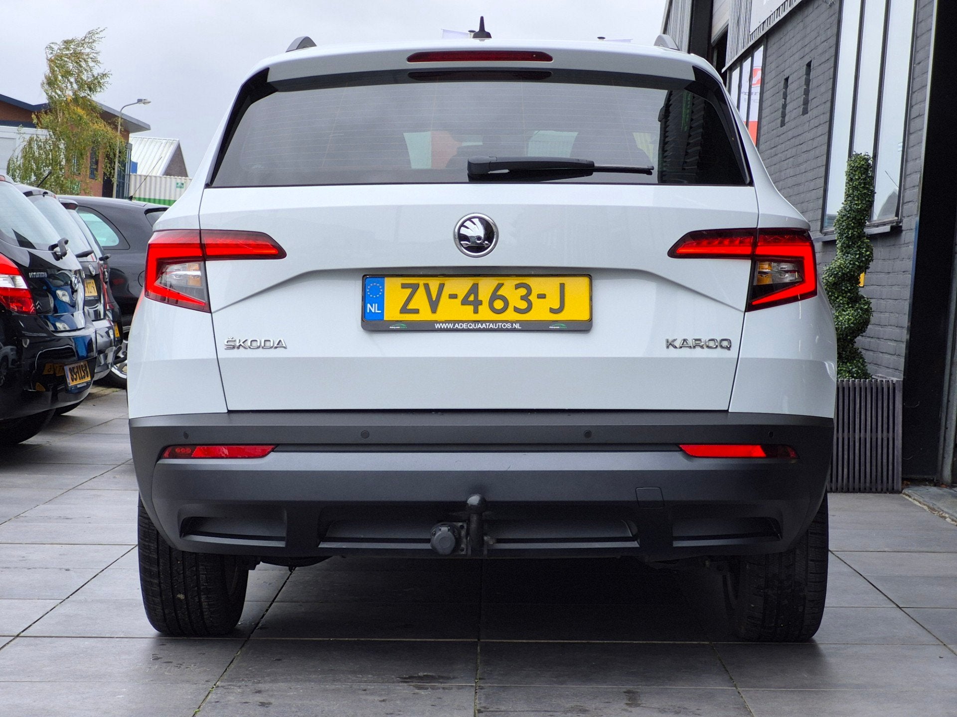 Skoda Karoq 1.0TSI Ambition Business|DSG|Cruise|Trekhaak|NAP, Auto's, Dealer onderhouden, Stof, Gebruikt, Met garantie (alle)