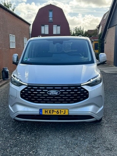 Ford Tourneo Custom Titaniun X   L2H1  8 persoons - BTW auto, Auto's, Dealer onderhouden, 1850 kg, Leder en Stof, Plug-in hybride