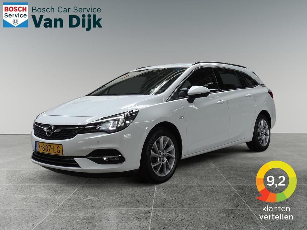 Opel Astra Sports Tourer 1.2 110pk Elegance/Trekhaak/Carplay, Auto's, Voorwielaandrijving, Gebruikt, Euro 6, Wit