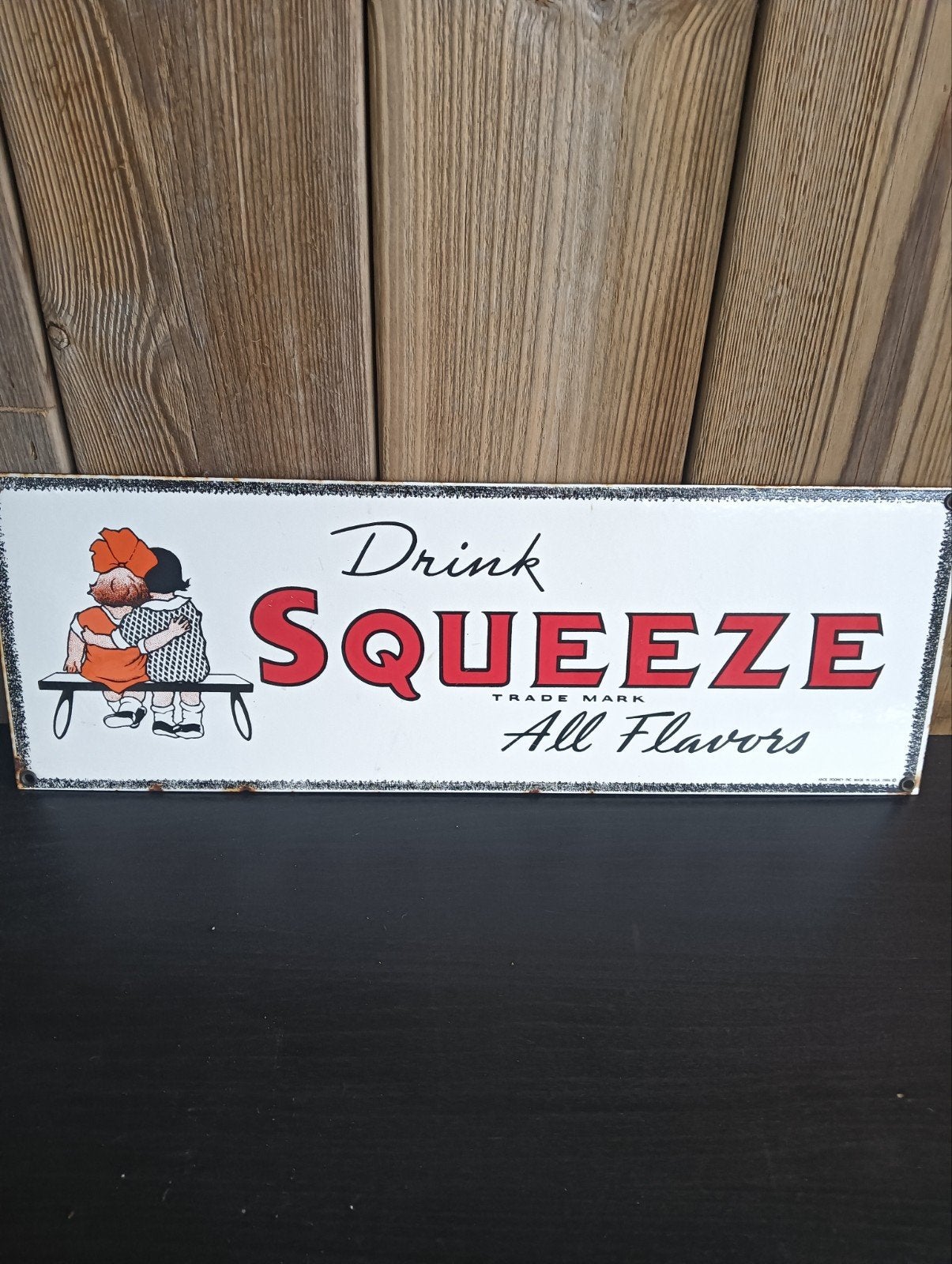 Metalen reclame bord van Squeeze, Ophalen, Reclamebord
