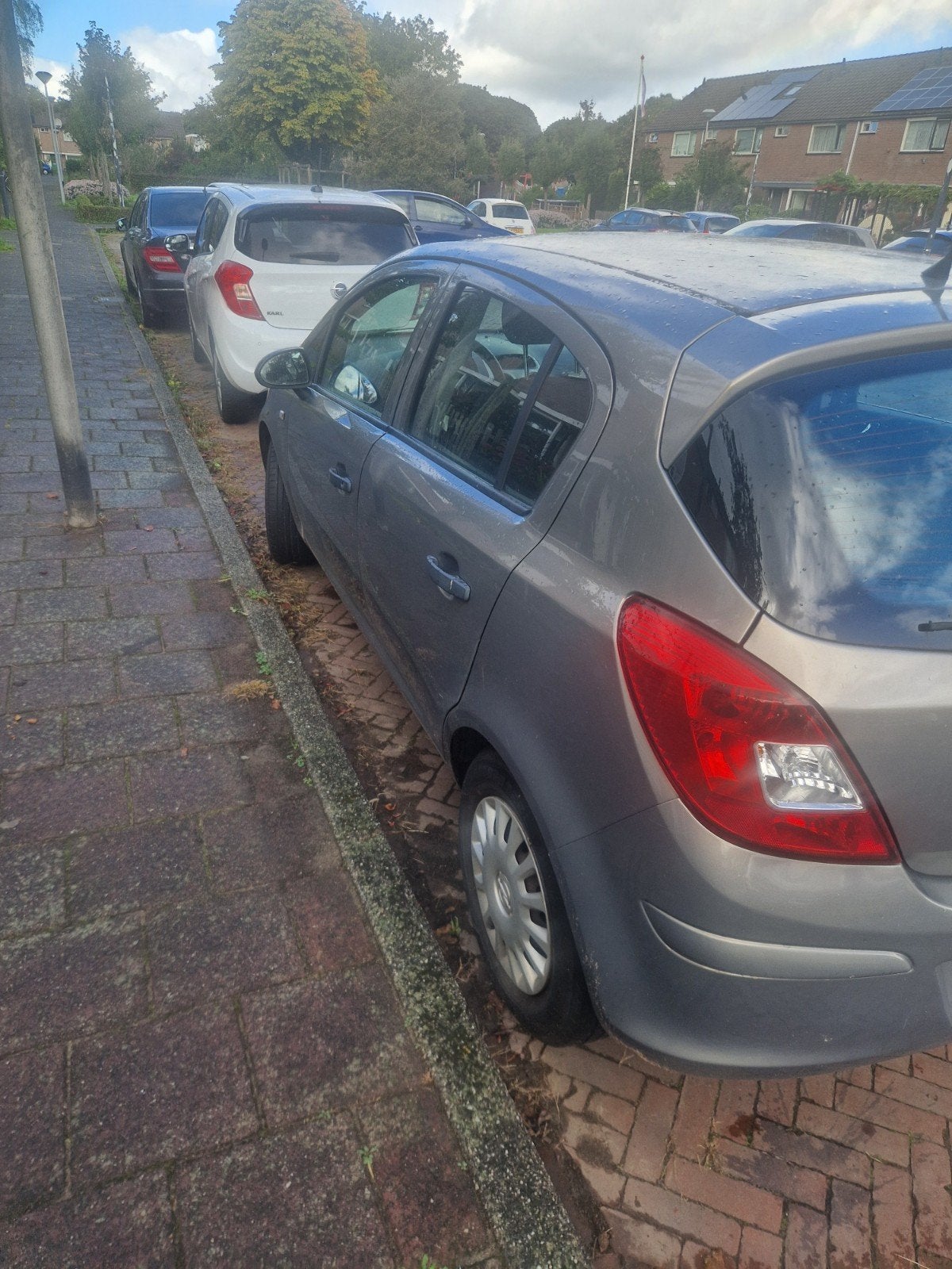 Opel Corsa 1.2 Twinport 85pk 5d 2010 Grijs, Voorwielaandrijving, 4 cilinders, 1229 cc, 49 €/maand