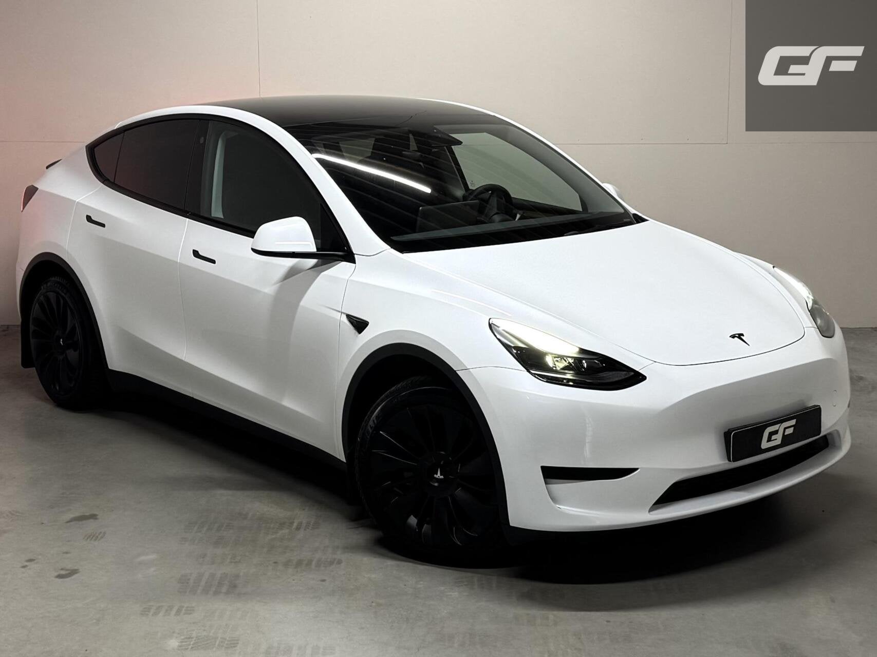 Tesla Model Y RWD 58 kWh Black Edition Trekhaak FSD, Auto's, Tesla, Automaat, 238 pk, Achterwielaandrijving, Gebruikt