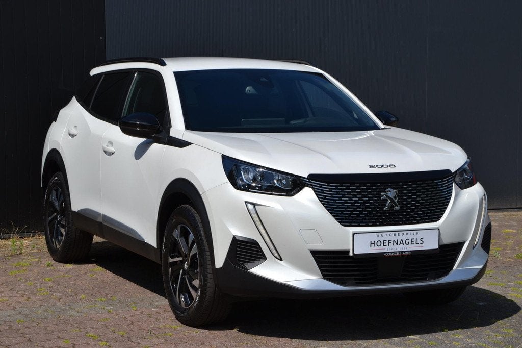 Peugeot 2008 1.2 PureTech 100 Allure * Navigatie * 3-D Cockp, Auto's, Gebruikt, 1199 cc, Wit, 3 cilinders