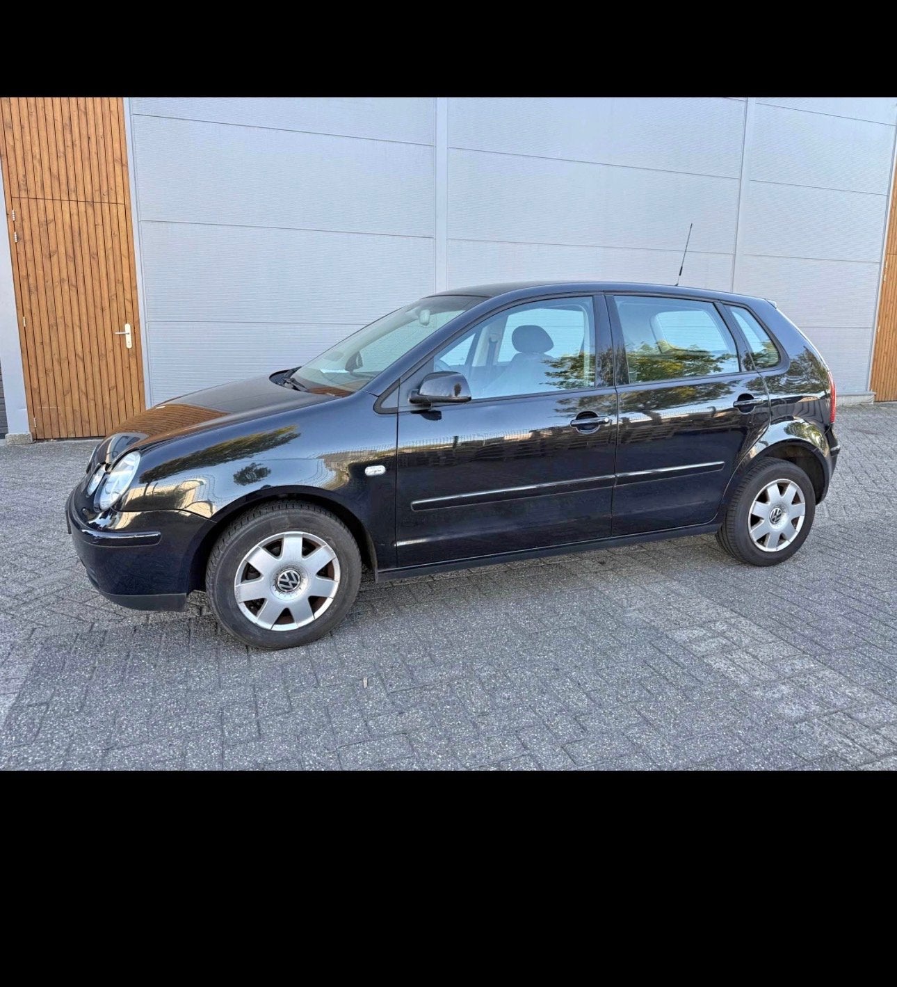 Volkswagen Polo 1.4 55KW AUT 2004 Zwart, Auto's, Volkswagen, Zwart, Origineel Nederlands, Particulier, 1000 kg