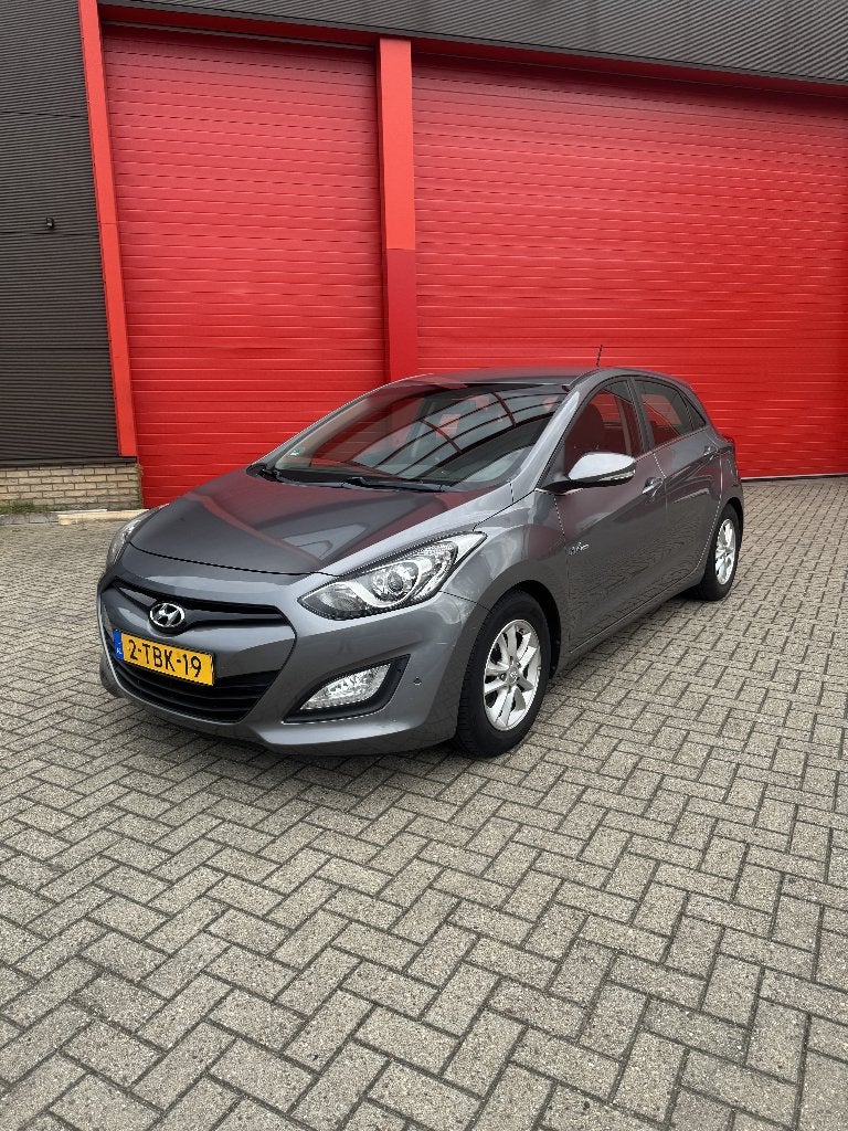 Hyundai i30 1.6 GDI | 2014 | 89.351 km | 5-deurs I APK, Voorwielaandrijving, Euro 5, 4 cilinders, Leder en Stof