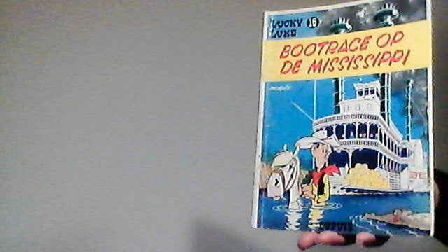 lucky luke nr 16 bootrace op de mississippi dupuis uit 1978, Boeken, Eén stripboek, Ophalen of Verzenden, Zo goed als nieuw