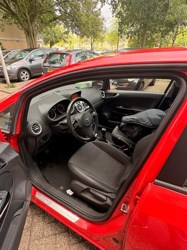 Opel Corsa 1.2 16V 5D 2013 Rood, Auto's, Opel, Voorwielaandrijving, 4 cilinders, 1229 cc, Handgeschakeld