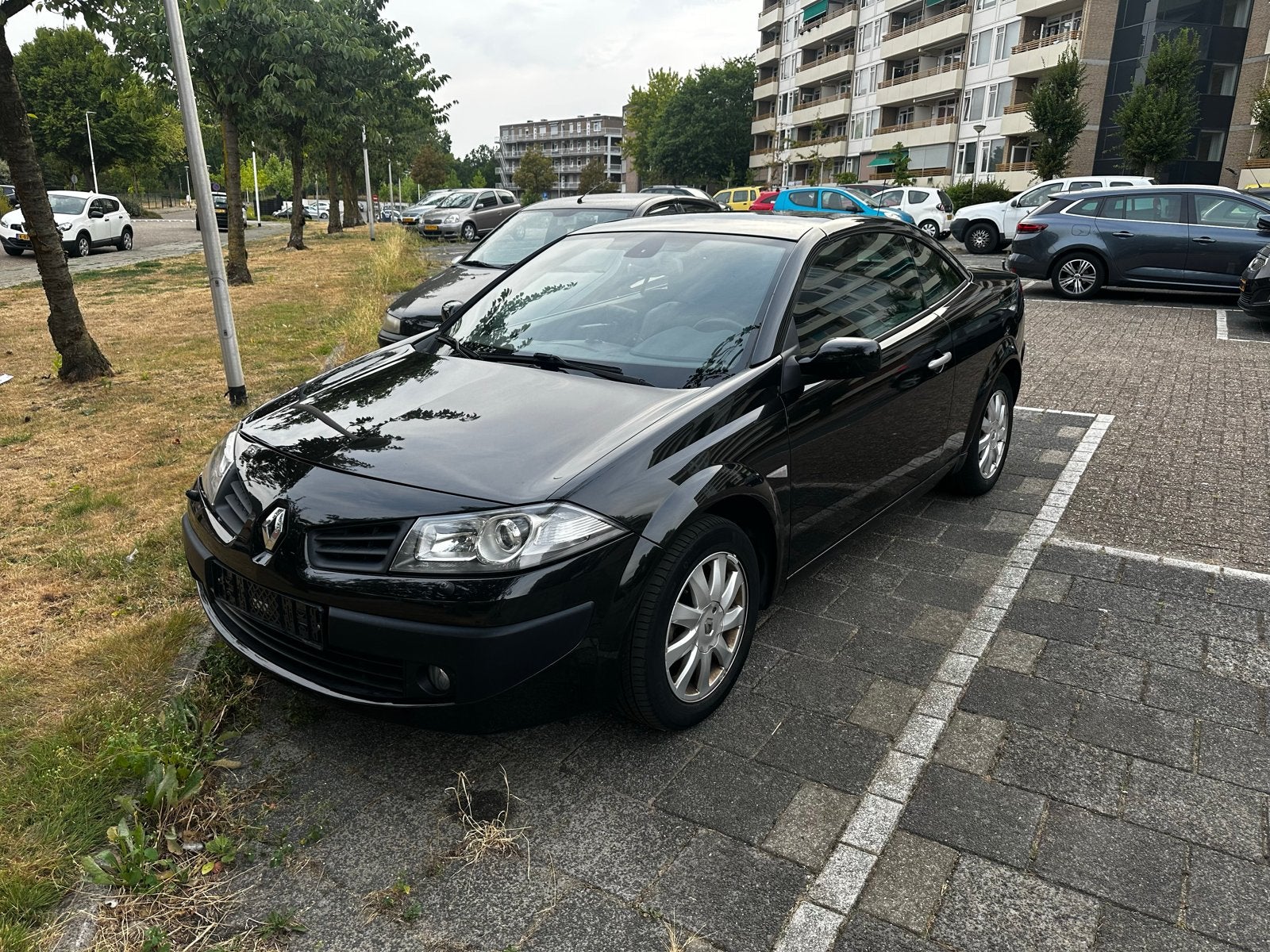 Renault Mégane 2.0 16V Cabrio AUT 2006 Zwart - Automaat, Auto's, Renault, 1998 cc, Zwart, 4 cilinders, Cabriolet