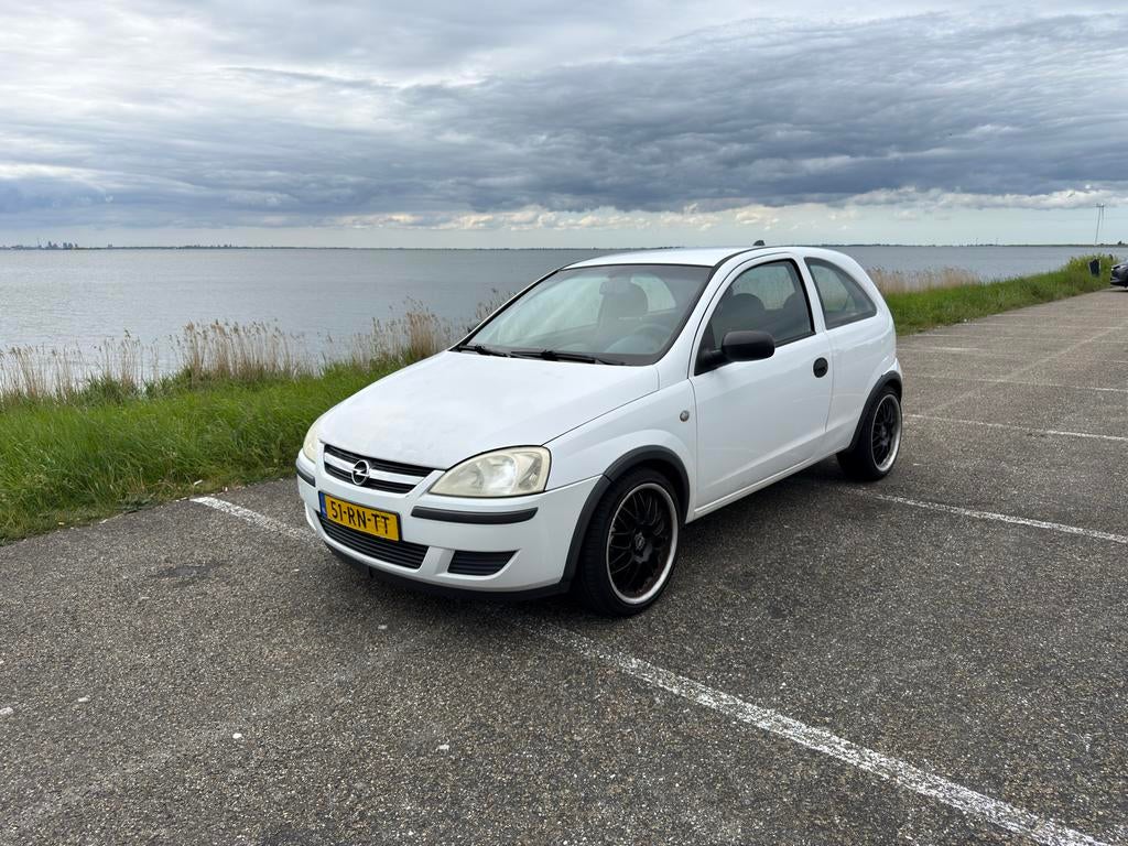 Opel Corsa 1.4 3D 2005 Wit, Voorwielaandrijving, 450 kg, 4 cilinders, Leder en Stof