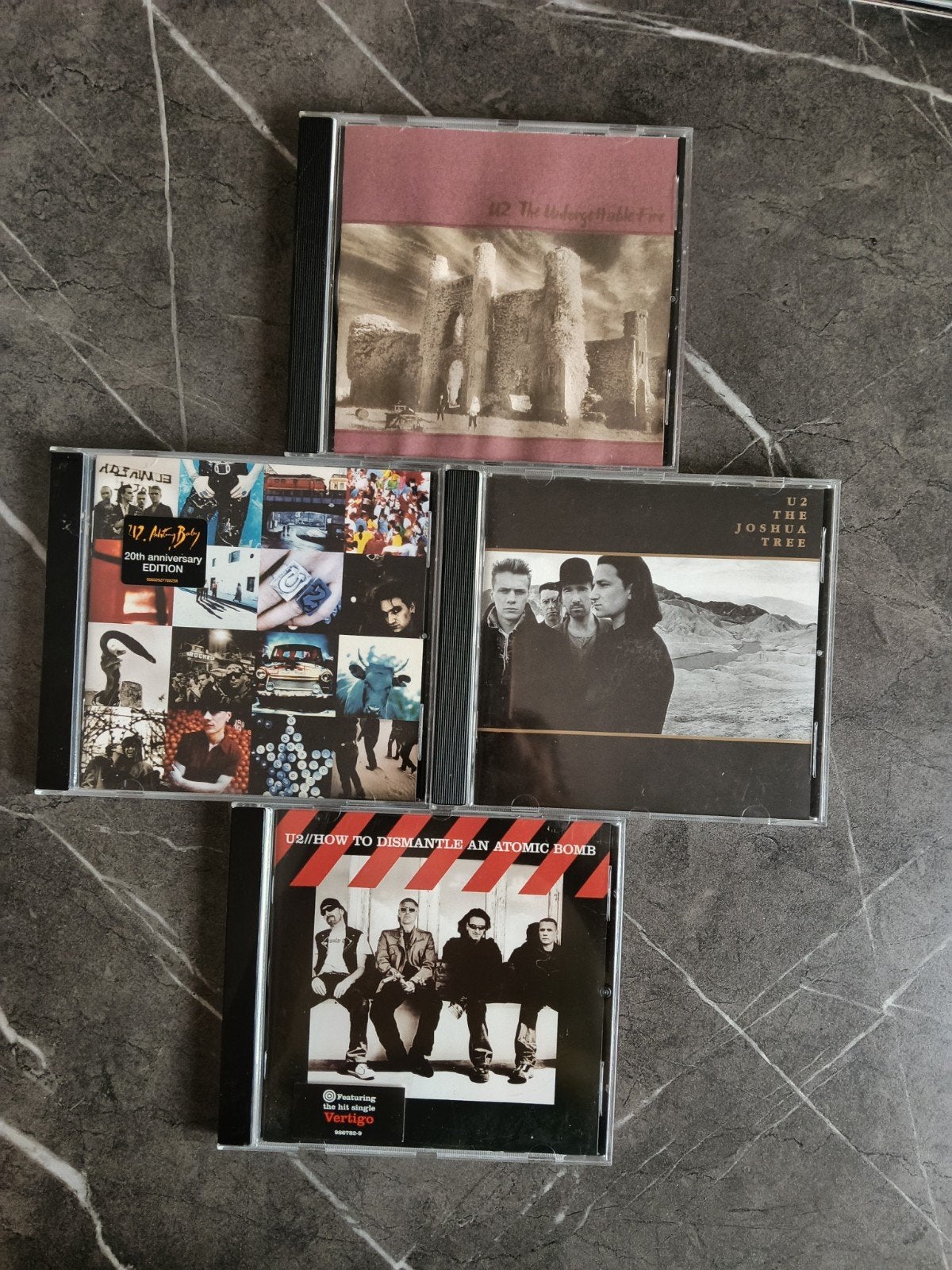 U2 CD collectie: 4 albums, zo goed als nieuw, Rock, Ophalen of Verzenden, Zo goed als nieuw, Inclusief doosje
