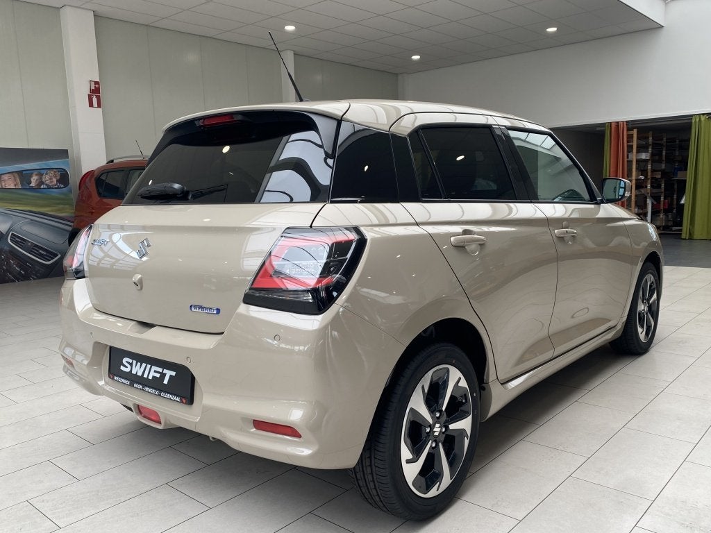 Suzuki Swift 1.2 Style SmartHyb. [ CLIMATE I ADAPTIEVE CRUIS, Auto's, Suzuki, 12 maanden, Stof, Gebruikt, Zwart