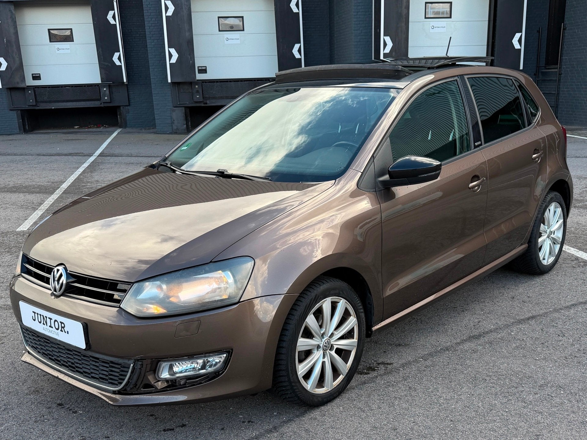 Volkswagen Polo 1.2-12V Style DEALERONDERHOUDEN/PANO/CARPLAY, Auto's, Voorwielaandrijving, Euro 5, Zwart, Bruin