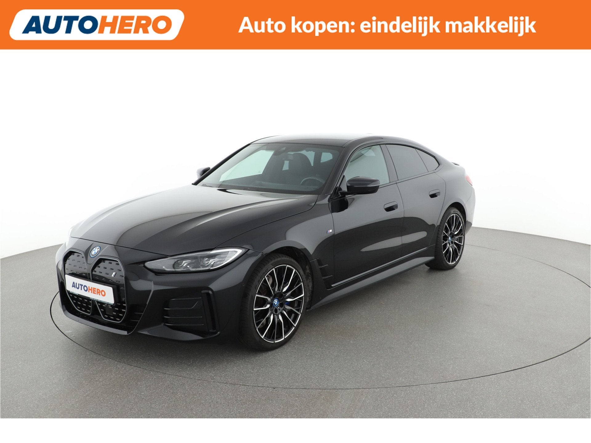 BMW i4 eDrive40 84 kWh | TA13501 | (bj 2023, automaat), Auto's, Achterwielaandrijving, Gebruikt, Met garantie (alle), Leder en Stof