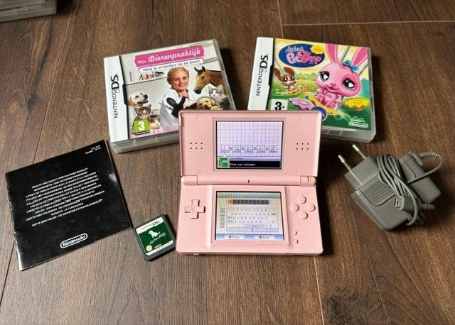 Nintendo DS lite set, Spelcomputers en Games, Ophalen of Verzenden, Roze, DS Lite, Gebruikt