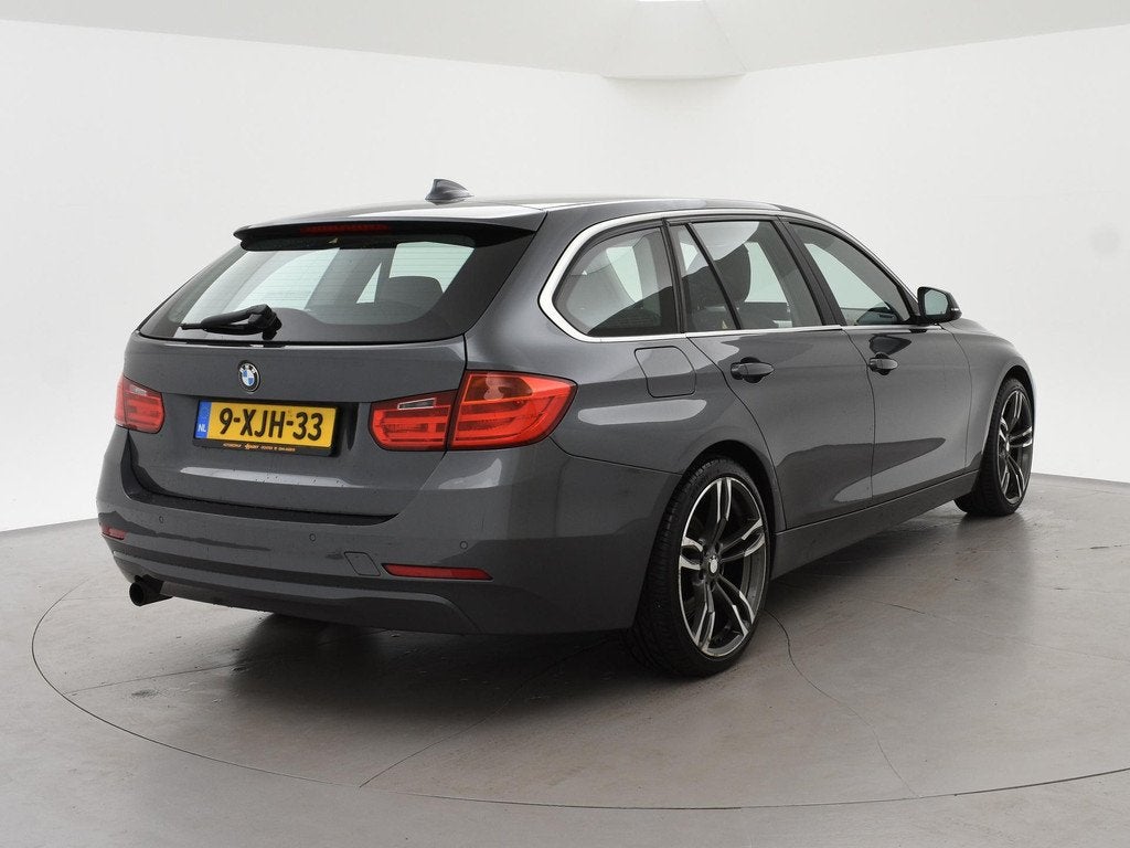 BMW 3-serie Touring 316i H.E AUT. + HEAD-UP DISPLAY | LEDER, Auto's, Automaat, Gebruikt, 4 cilinders, Automatische klimaatregeling