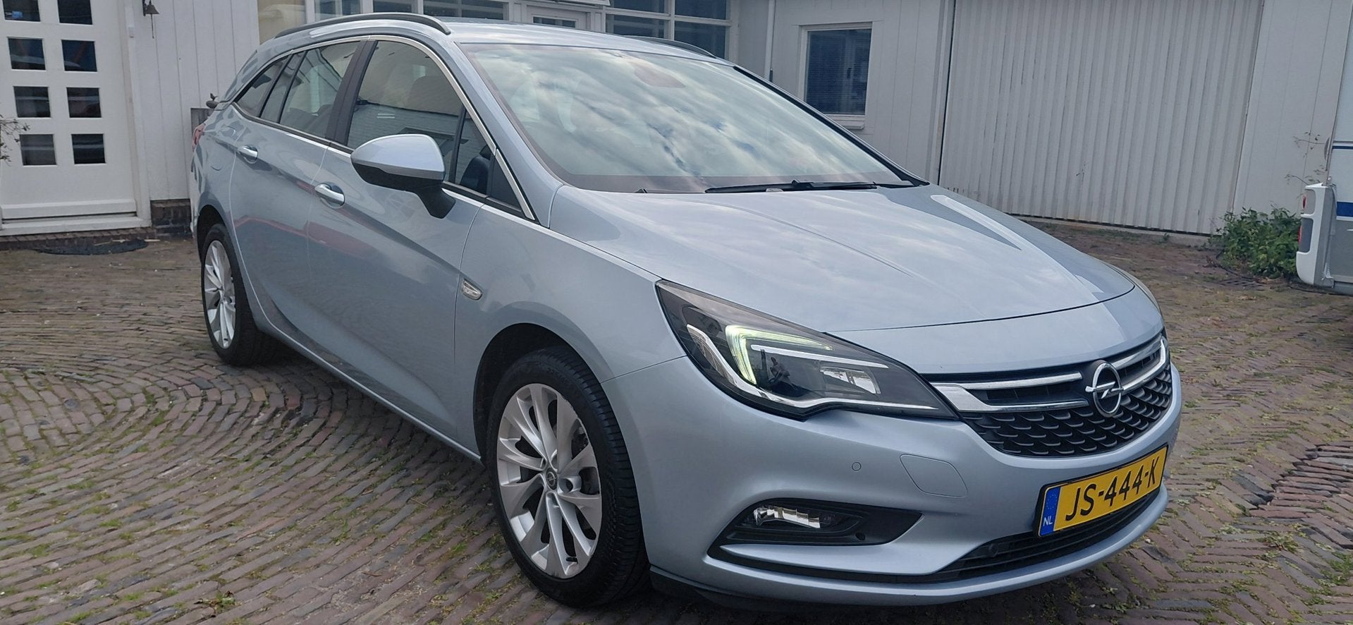Opel Astra Sports Tourer 1.0 Edition 100 % Opeldealer onderh, Voorwielaandrijving, Gebruikt, 1178 kg, Met garantie (alle)