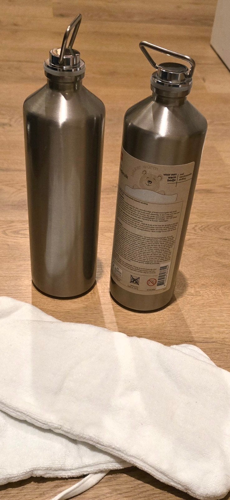 Hema RVS kruiken met 2 witte kruikenzakken - Zo goed als nie, Ophalen of Verzenden, Zo goed als nieuw