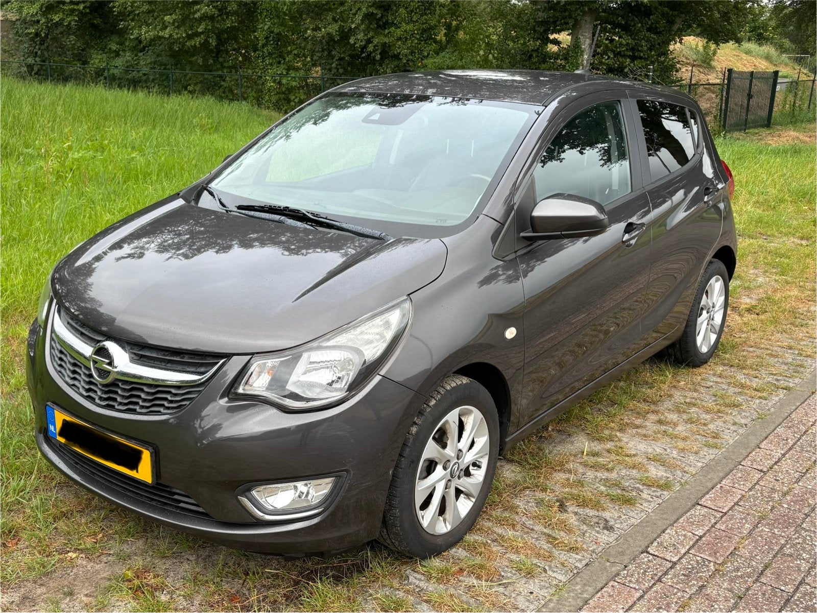 Opel Karl 1.0 Ecoflex 55KW 2015 Grijs, Auto's, Opel, Voorwielaandrijving, 839 kg, 74 pk, Zwart