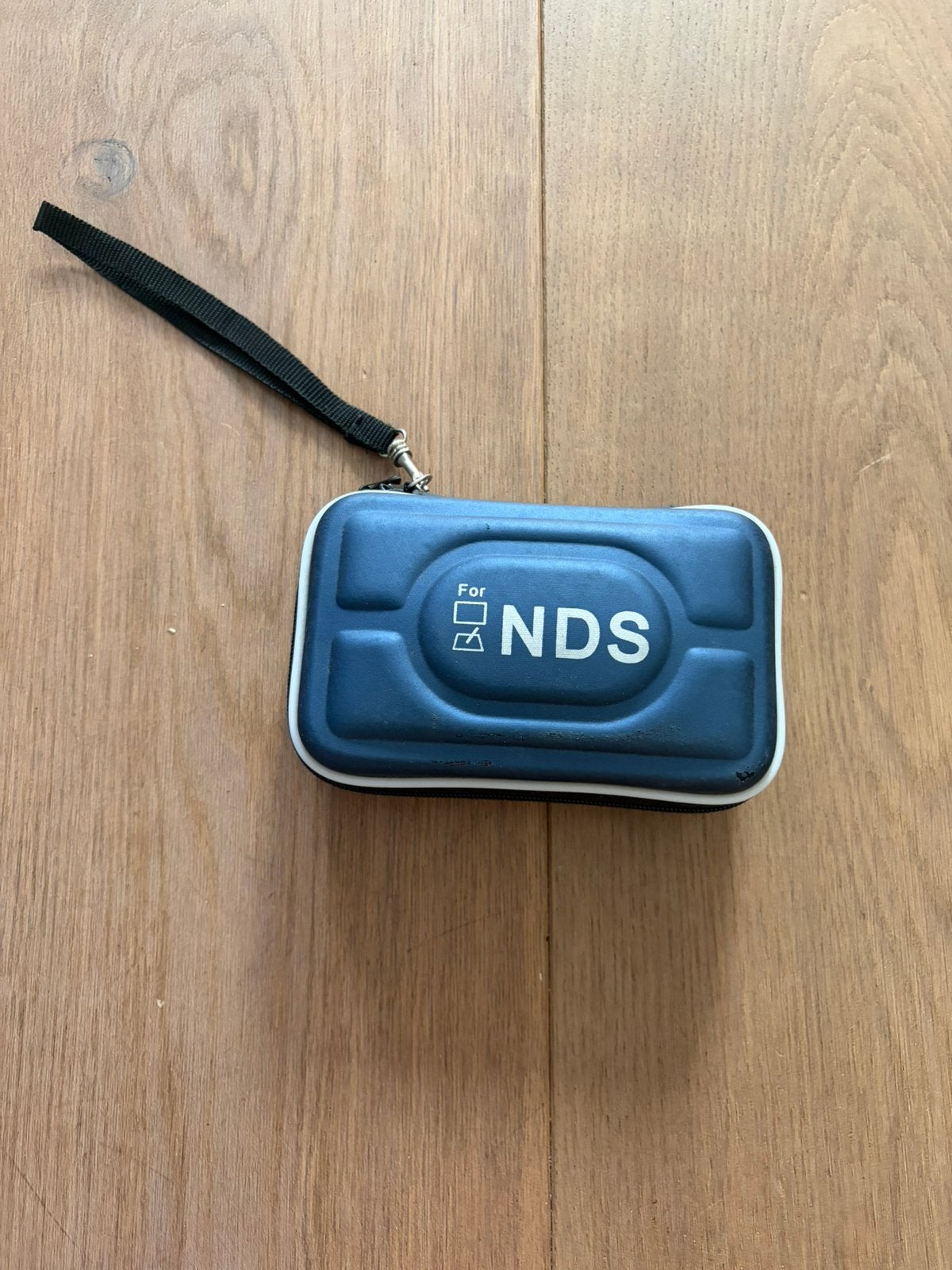 Nintendo DS Lite + 7 spellen, Wit, Ophalen of Verzenden, Zo goed als nieuw, Met beschermhoes of tas