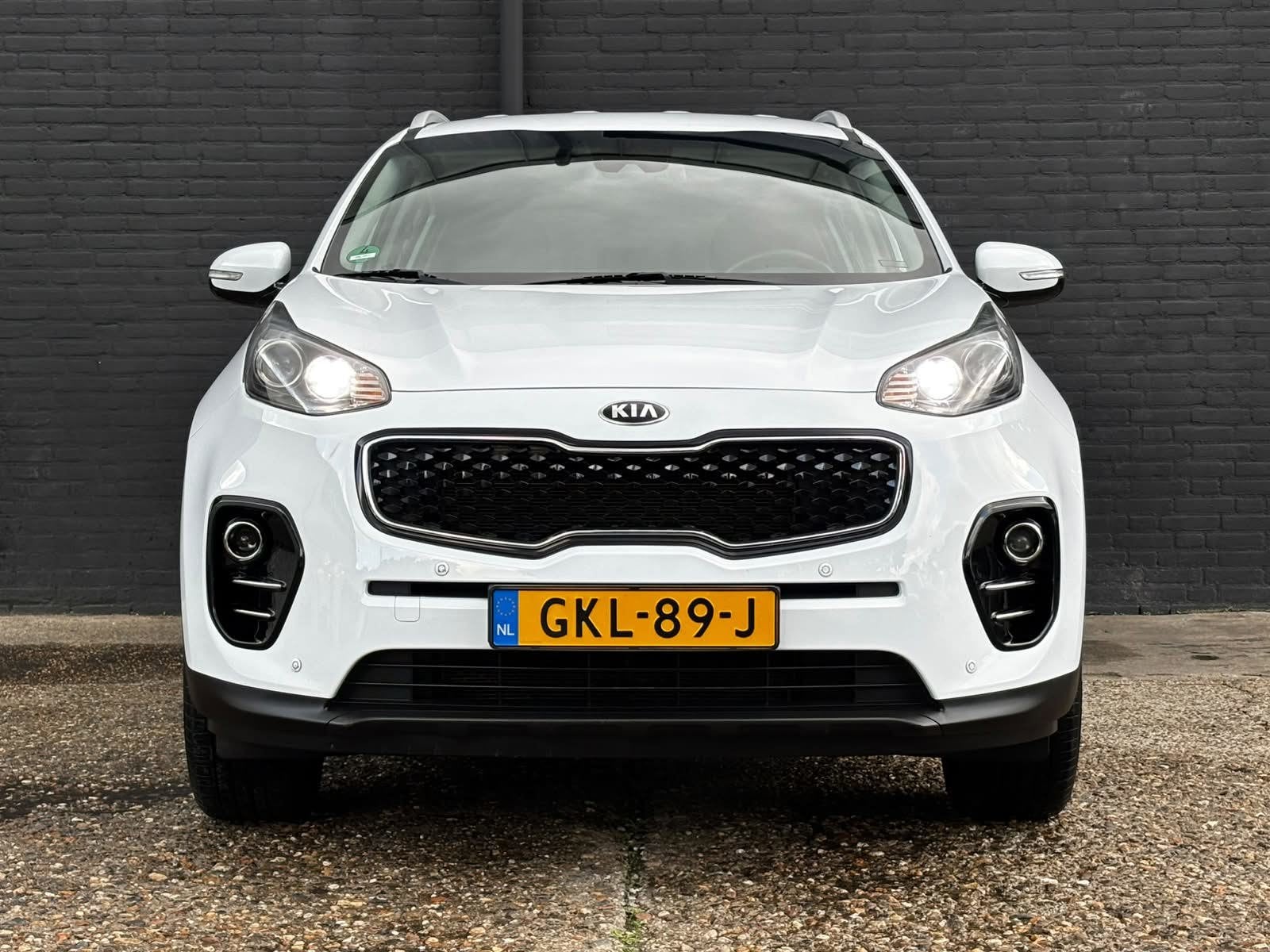 Kia SPORTAGE 1.6 GDI Design Edition CAMERA|TREKHAAK|NAVI|140, Auto's, Voorwielaandrijving, Gebruikt, 4 cilinders, Verwarming stoelen achter
