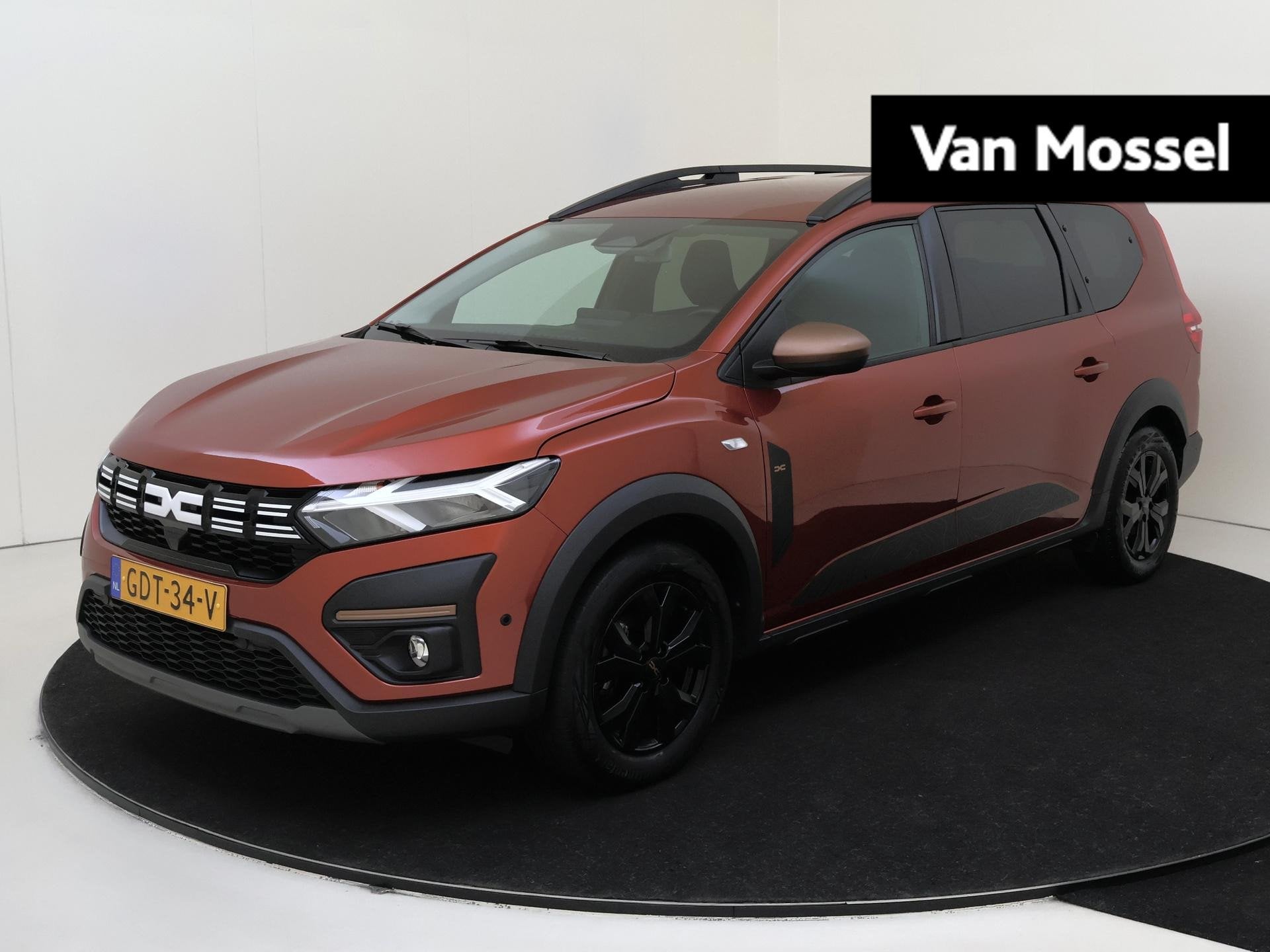 Dacia Jogger 1.6 Hybrid 140 Extreme 7p. | 1e Eigenaar | Navi, Gebruikt, 4 cilinders, Bruin, 7 stoelen