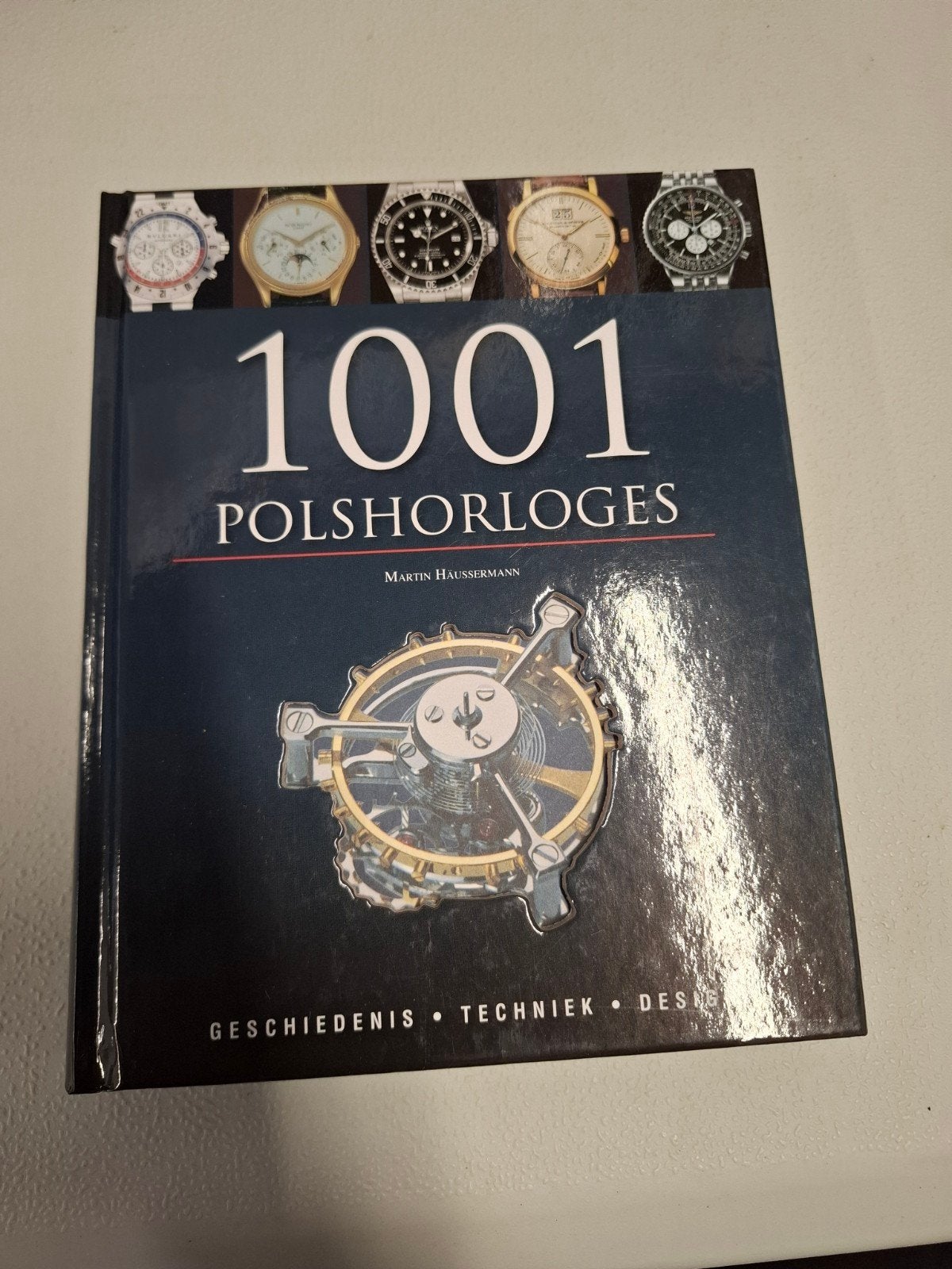1001 Polshorloges: Geschiedenis, Techniek, Design, Boeken, 20e eeuw of later, Zo goed als nieuw, Martin Haussermann, Ophalen of Verzenden