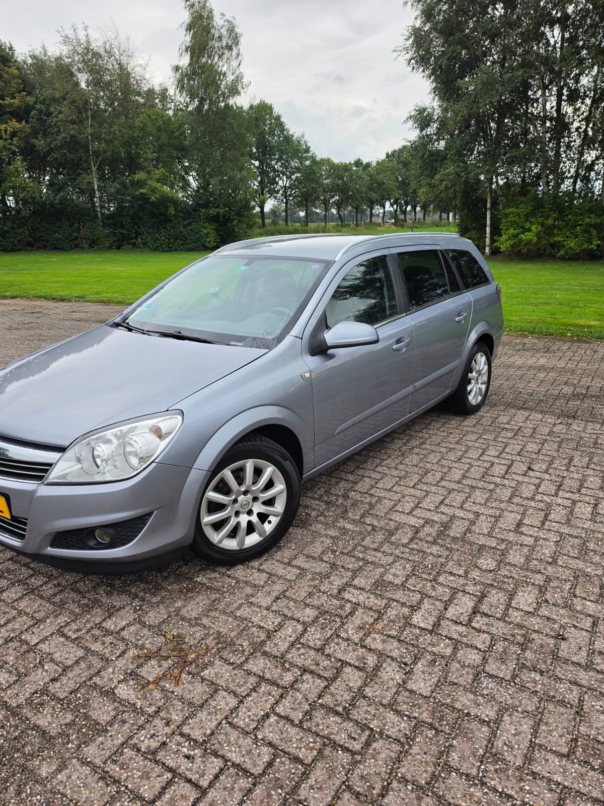 Opel Astra 1.6 16V 85KW St.wgn. 2008 Grijs, Auto's, Voorwielaandrijving, 657 kg, 15 km/l, 4 cilinders