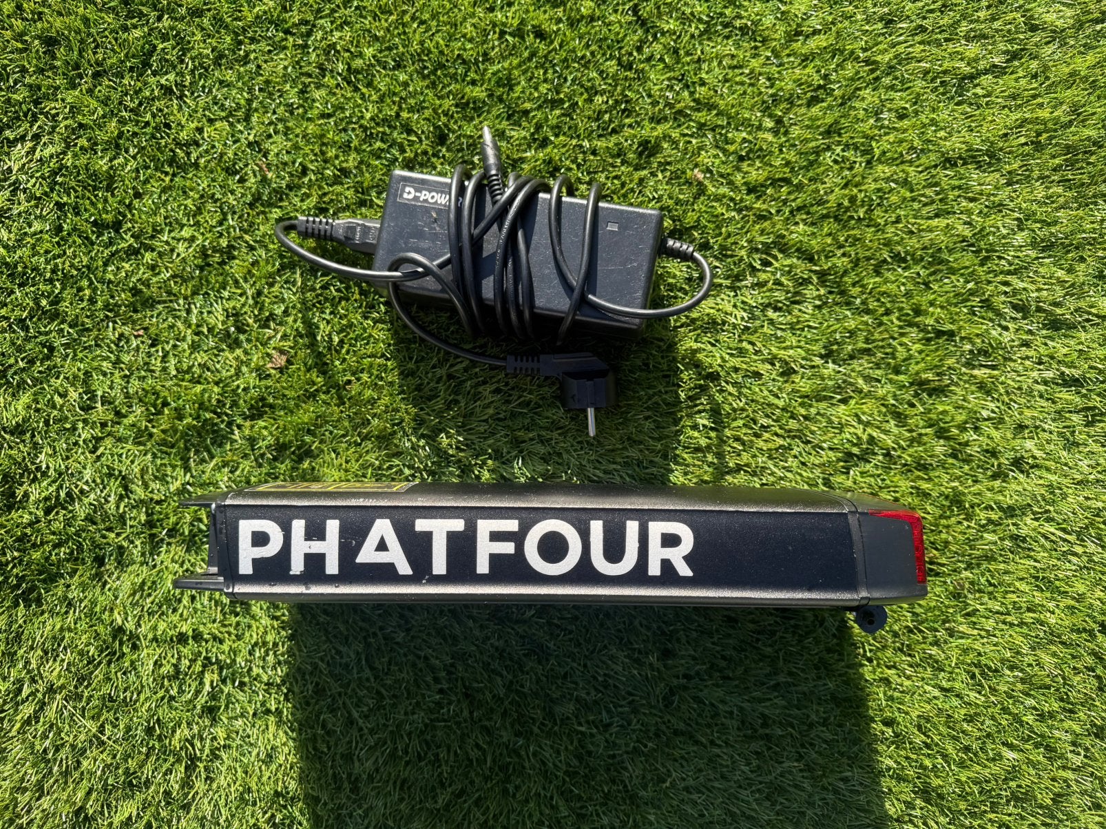 Phatfour accu inclusief oplader (Moet Weg!), Gebruikt