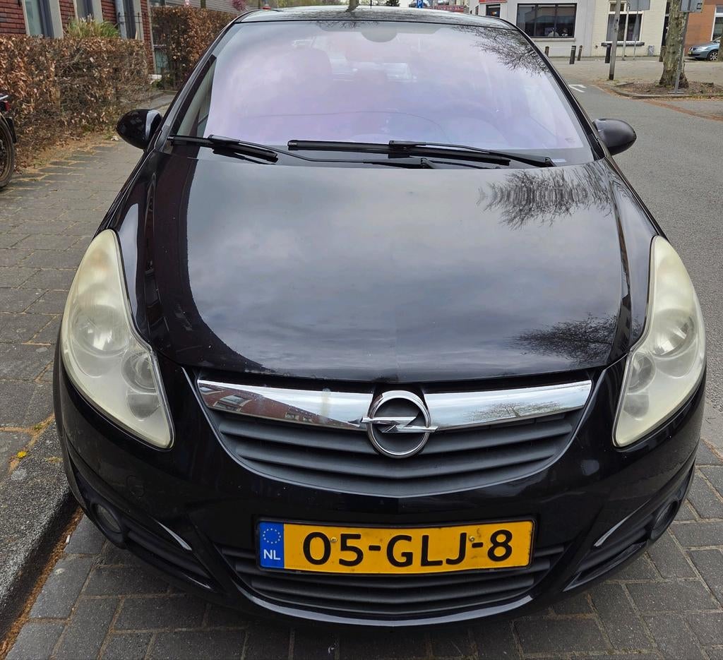 Opel Corsa 1.4 16V 5D 2008 Zwart. APK 16-9-26., Voorwielaandrijving, Zwart, 4 cilinders, Origineel Nederlands