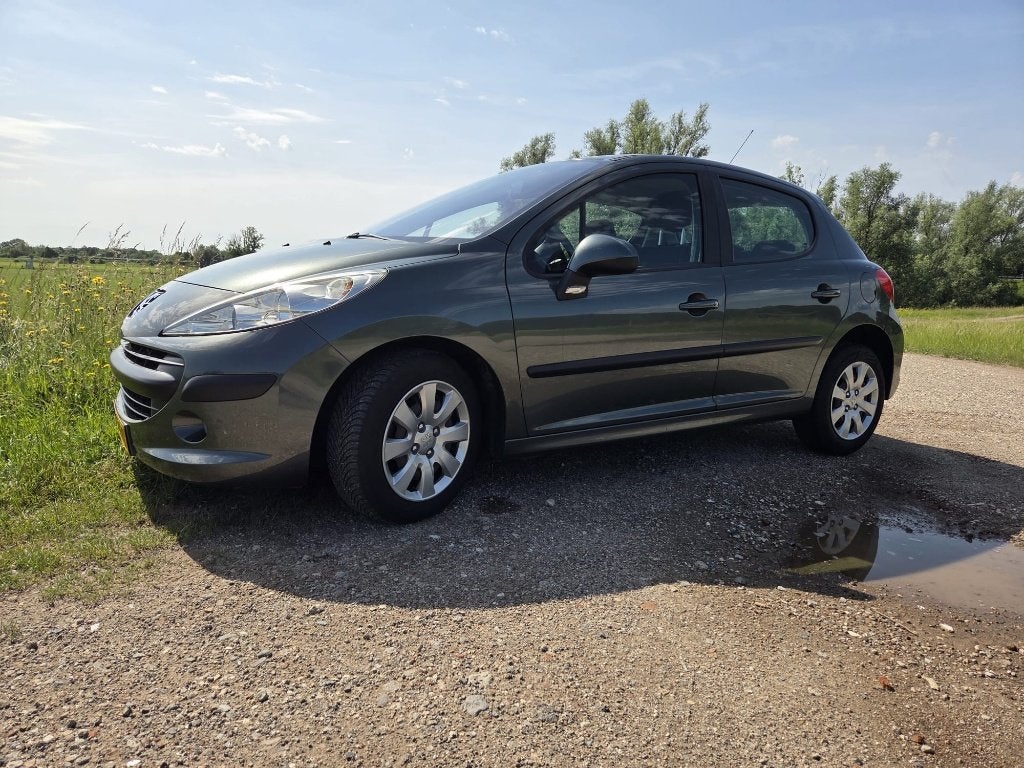 Peugeot 207 1.4 16V 5DRS 2007 Grijs, Voorwielaandrijving, Stof, 1360 cc, Elektrische ramen