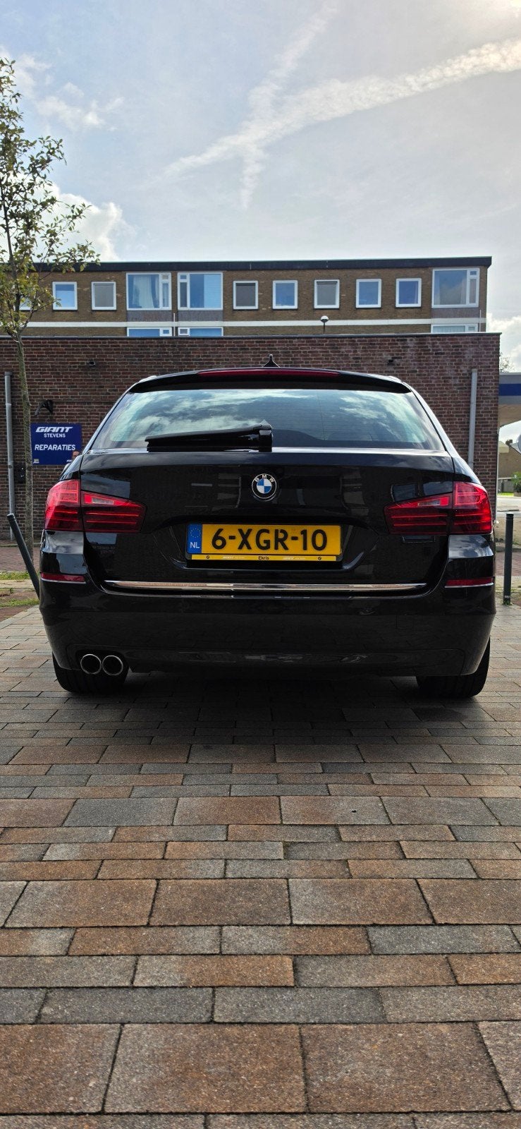 BMW 5-Serie 2.0 518D Touring AUT 2014 Zwart, Auto's, Automaat, Achterwielaandrijving, 1995 cc, 2000 kg